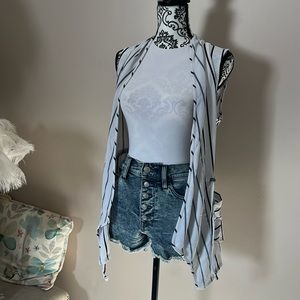 Size small wire and blue striped vest from Maurice’s